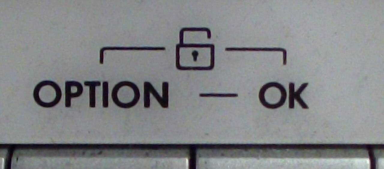 Sélecteur de programmes et pictogrammes sur un lave-linge